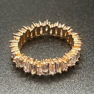 Rose Gold Tone Baguette Crystal Eternity Band Ring. Size 10. Very pretty ring.